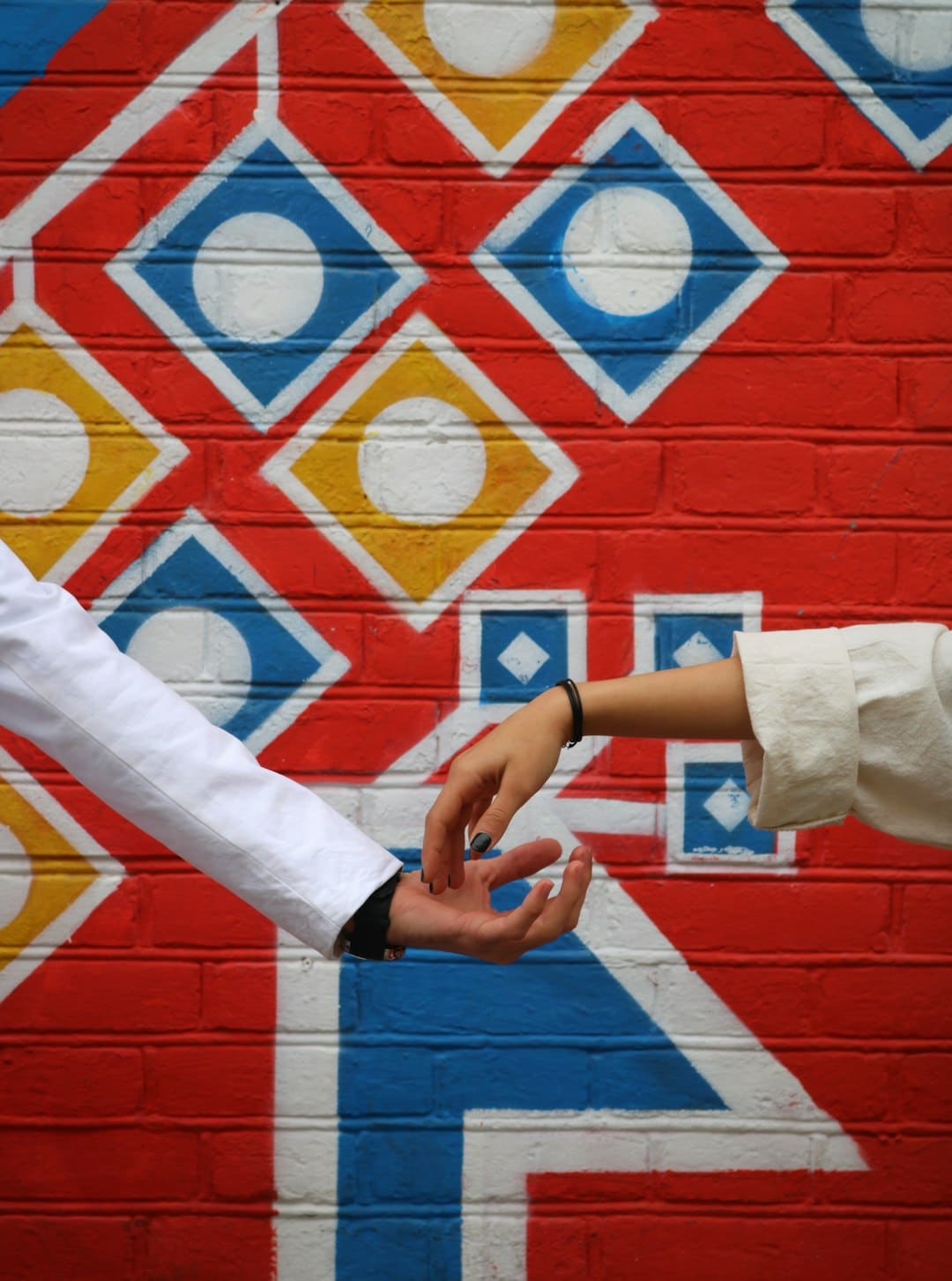 A handshake over a land title deed